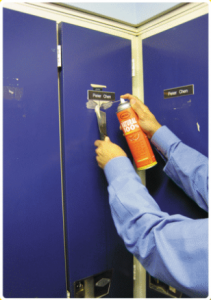 removing decal from lockers with the Natural 100% degreaser