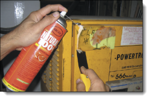 removing decal from equipment with the Natural 100% degreaser
